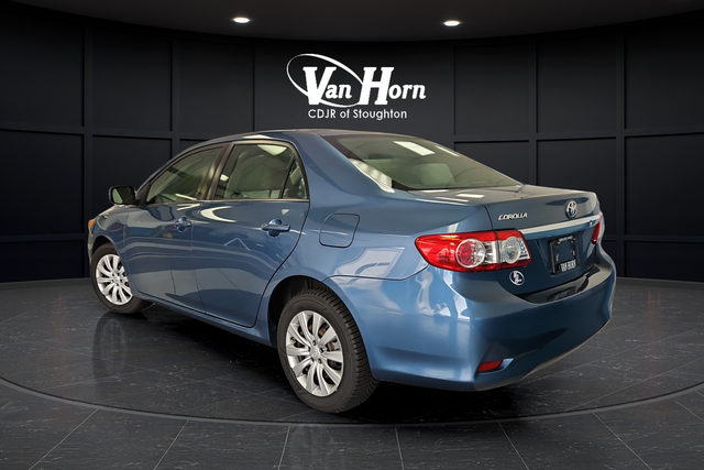 Used 2013 Tropical Sea Metallic Toyota LE image 5