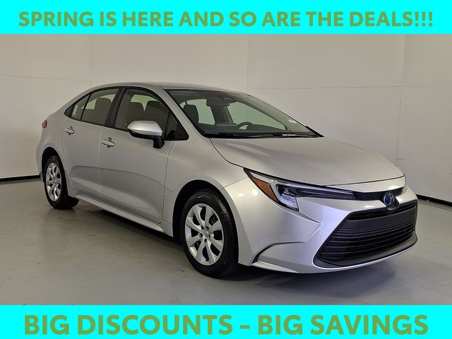 Silver 2025 Toyota Corolla Hybrid LE FWD Sedan Front-Wheel Drive Continuously Variable Transmission