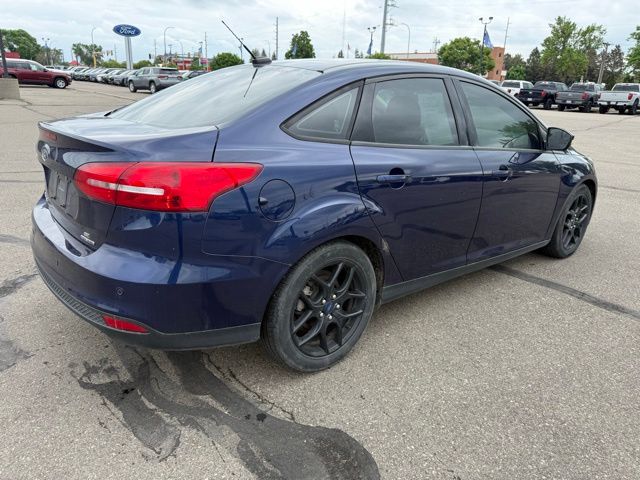 2016 Blue Ford Focus SE FWD Sedan