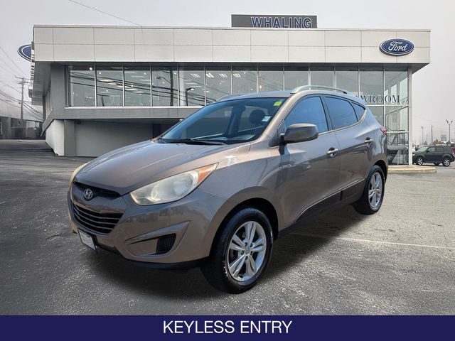 Used 2011 Hyundai Tucson GLS with VIN KM8JU3AC4BU197409 for sale in New London, CT