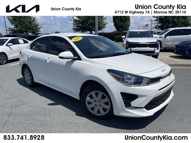 Clear White 2023 Kia Rio Sedan Front-Wheel Drive Continuously Variable Transmission
