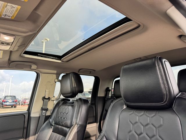 2024 Nissan Frontier SL Red at DeMontrond Auto Country