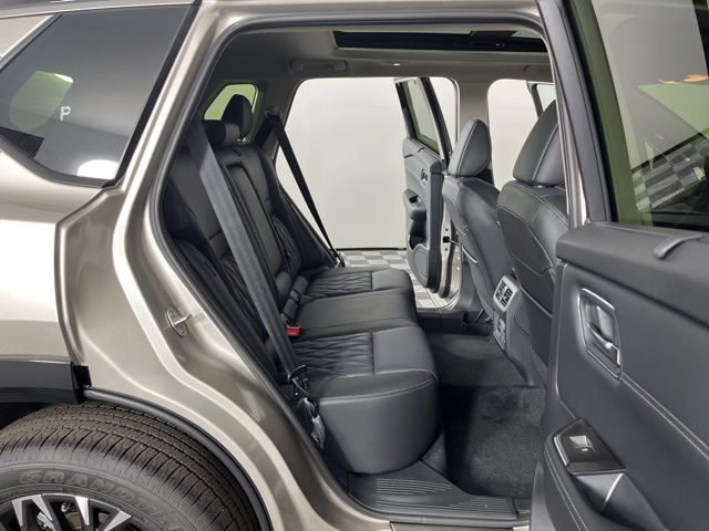 2025 Champagne Silver Metallic/Super Black Nissan Rogue Platinum FWD SUV