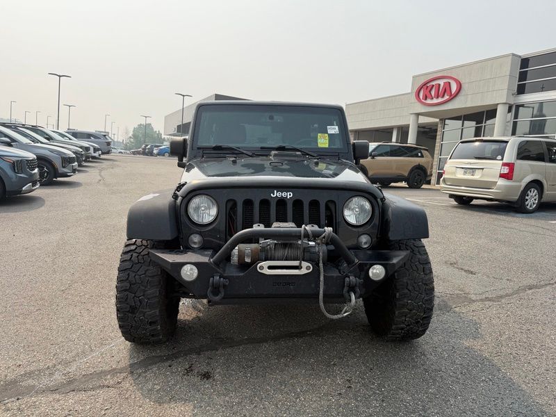 Used 2016 Jeep Wrangler Unlimited Sport S with VIN 1C4BJWDG3GL191373 for sale in Massillon, OH