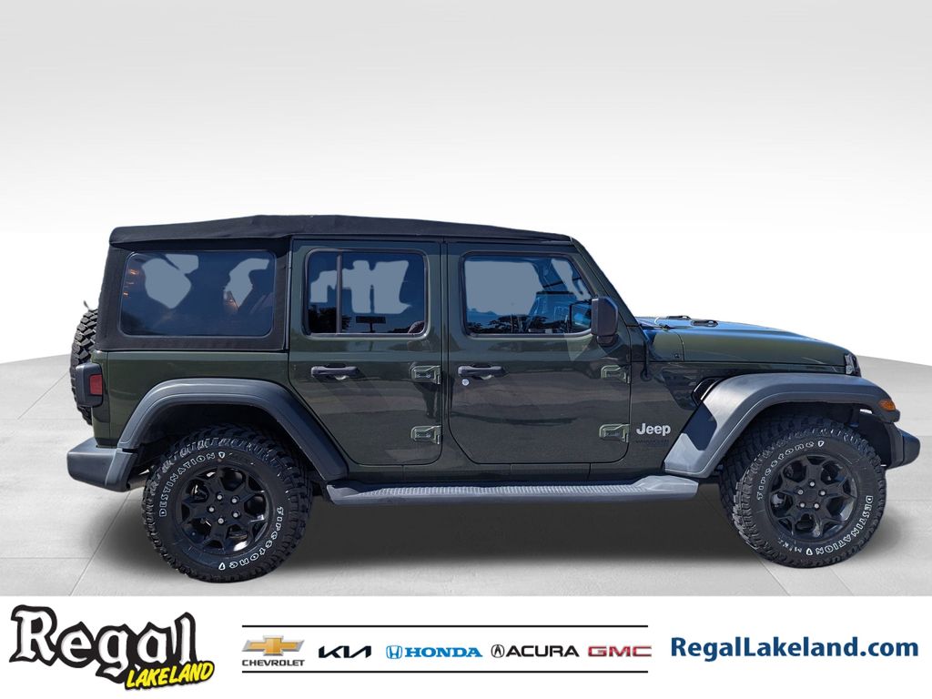 used 2021 Jeep Wrangler car, priced at $23,396