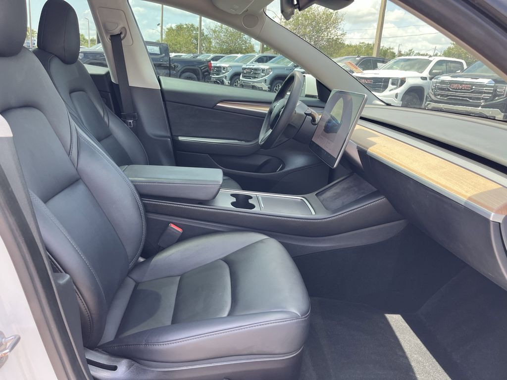 used 2023 Tesla Model 3 car, priced at $27,392