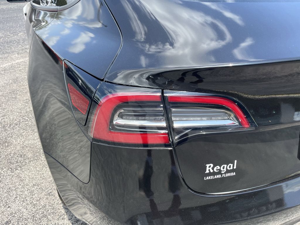 used 2023 Tesla Model 3 car, priced at $27,392