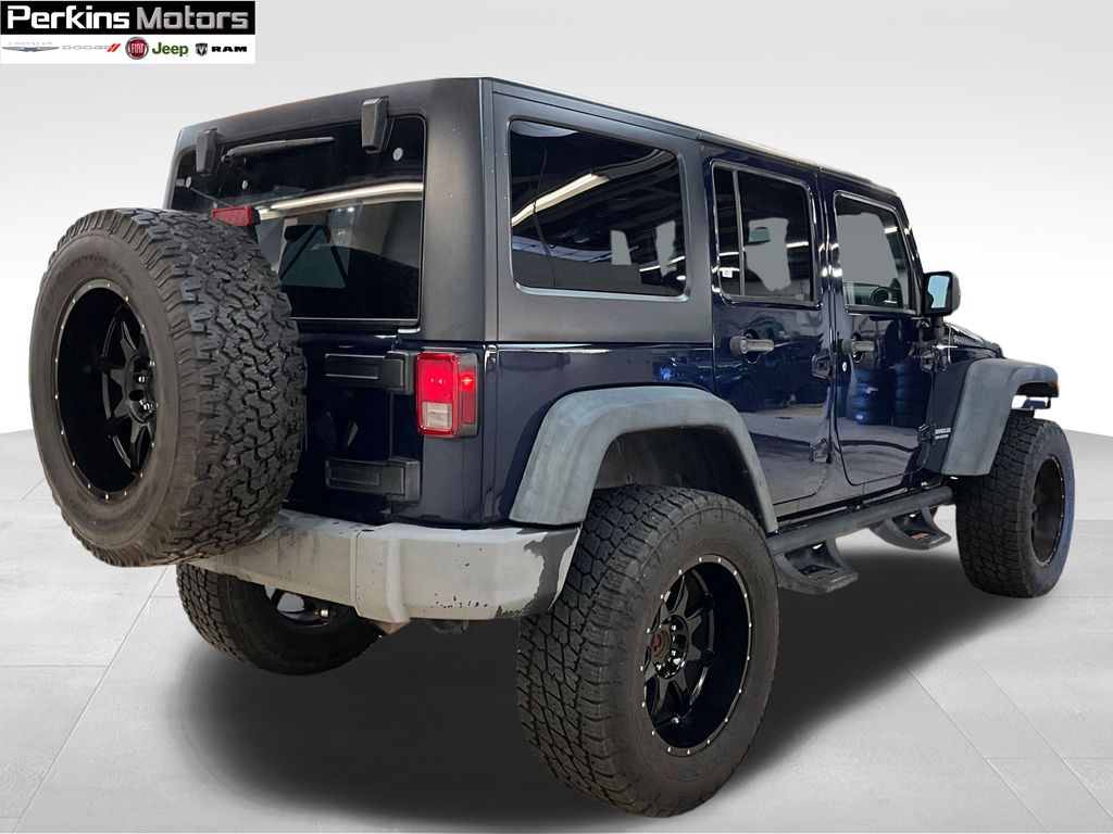 used 2013 Jeep Wrangler car, priced at $22,555