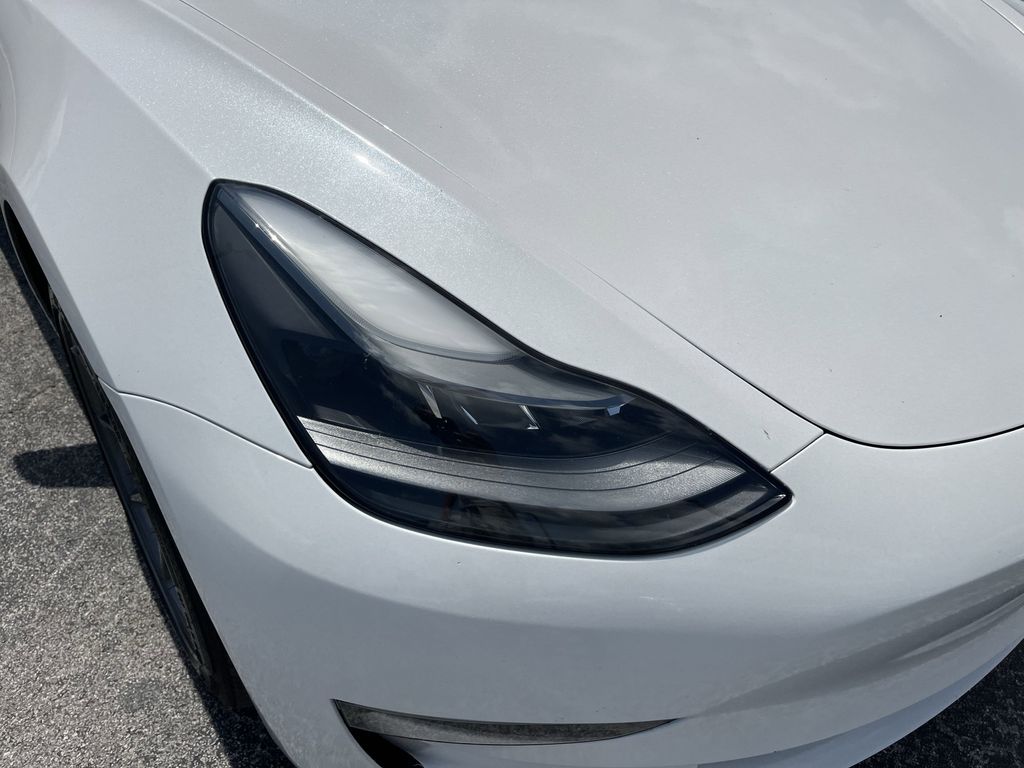 used 2023 Tesla Model 3 car, priced at $27,392