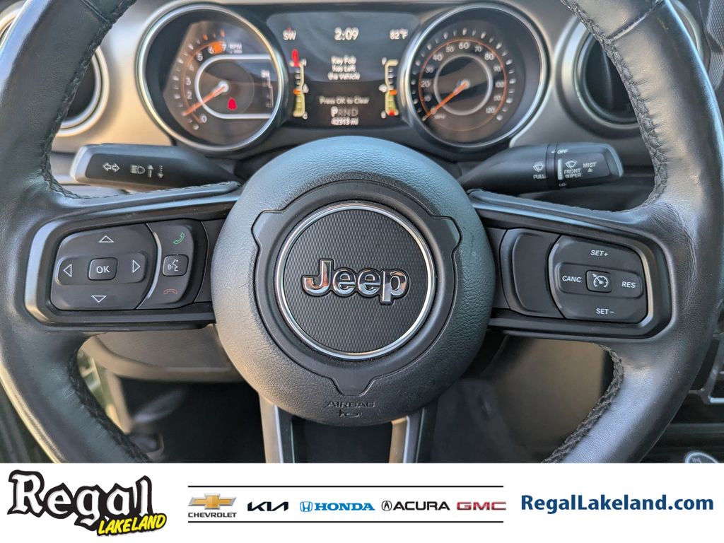 used 2021 Jeep Wrangler car, priced at $23,396