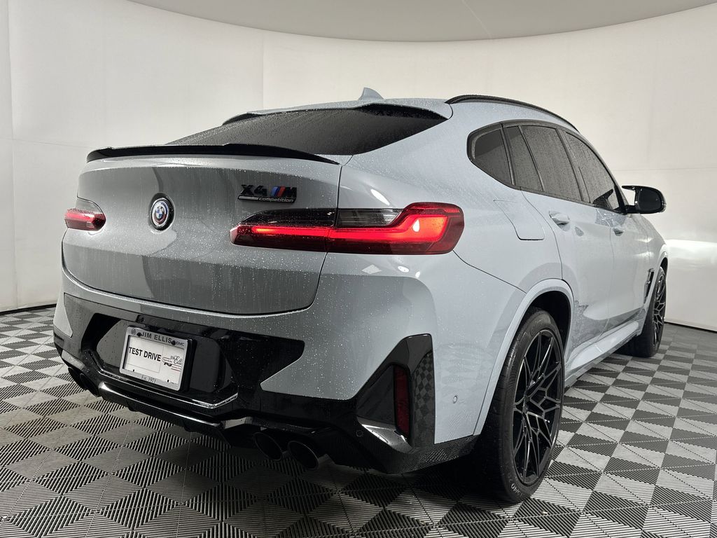 used 2023 BMW X4 M car, priced at $63,892