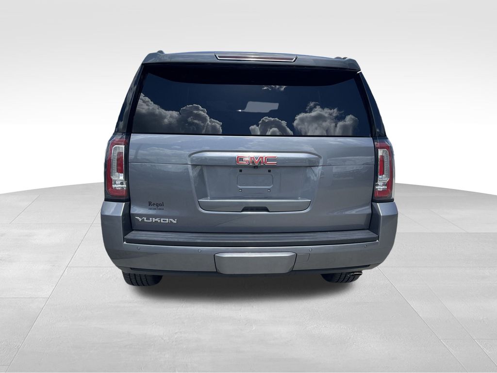 used 2019 GMC Yukon car, priced at $27,591