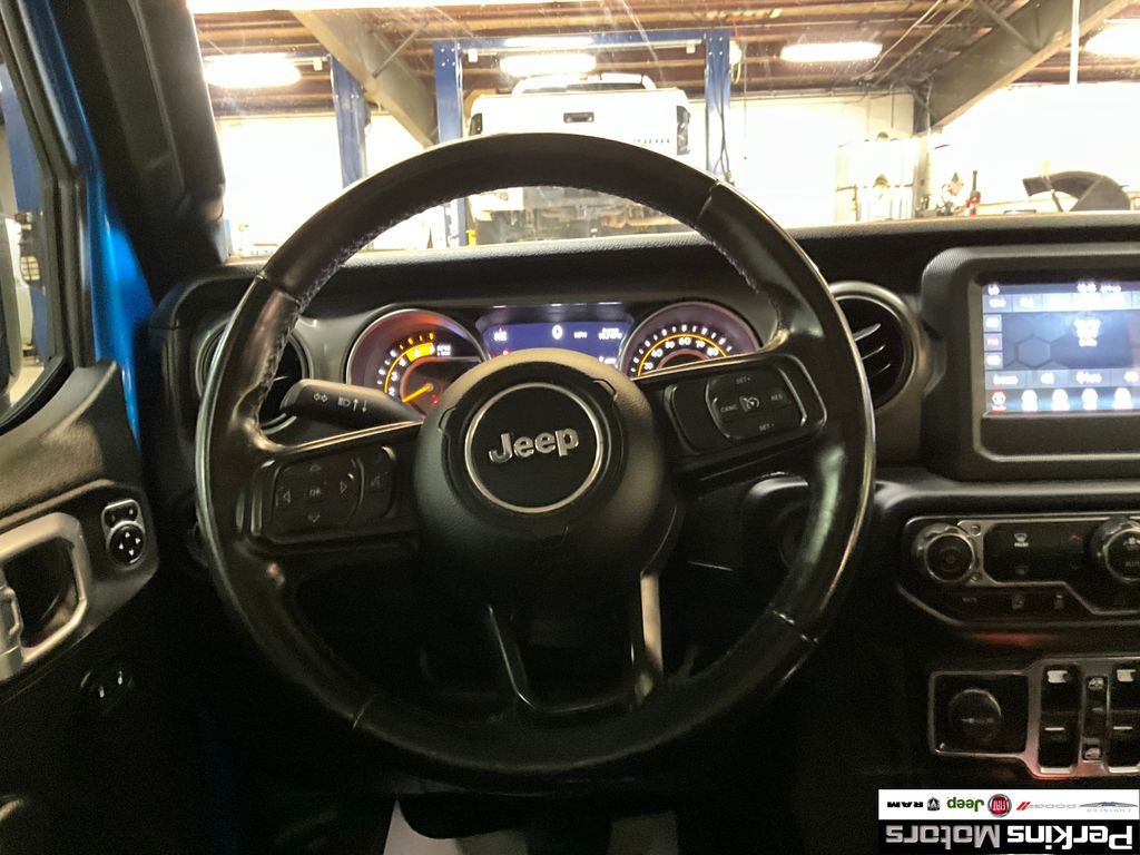 used 2021 Jeep Wrangler car, priced at $30,059