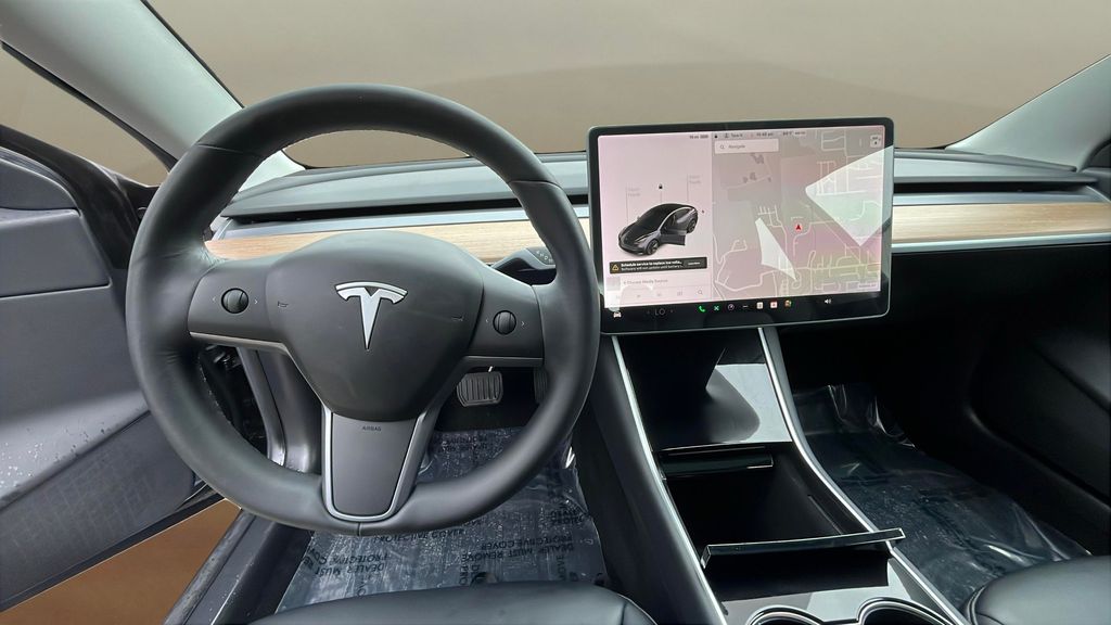 used 2019 Tesla Model 3 car, priced at $15,999