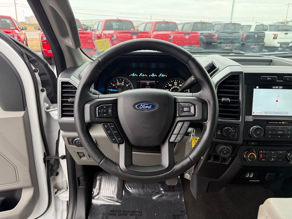 used 2018 Ford F-150 car, priced at $25,000