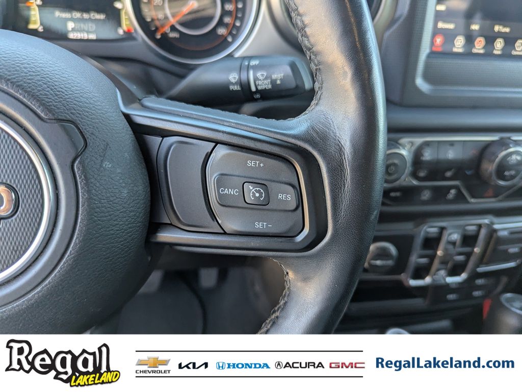 used 2021 Jeep Wrangler car, priced at $23,396