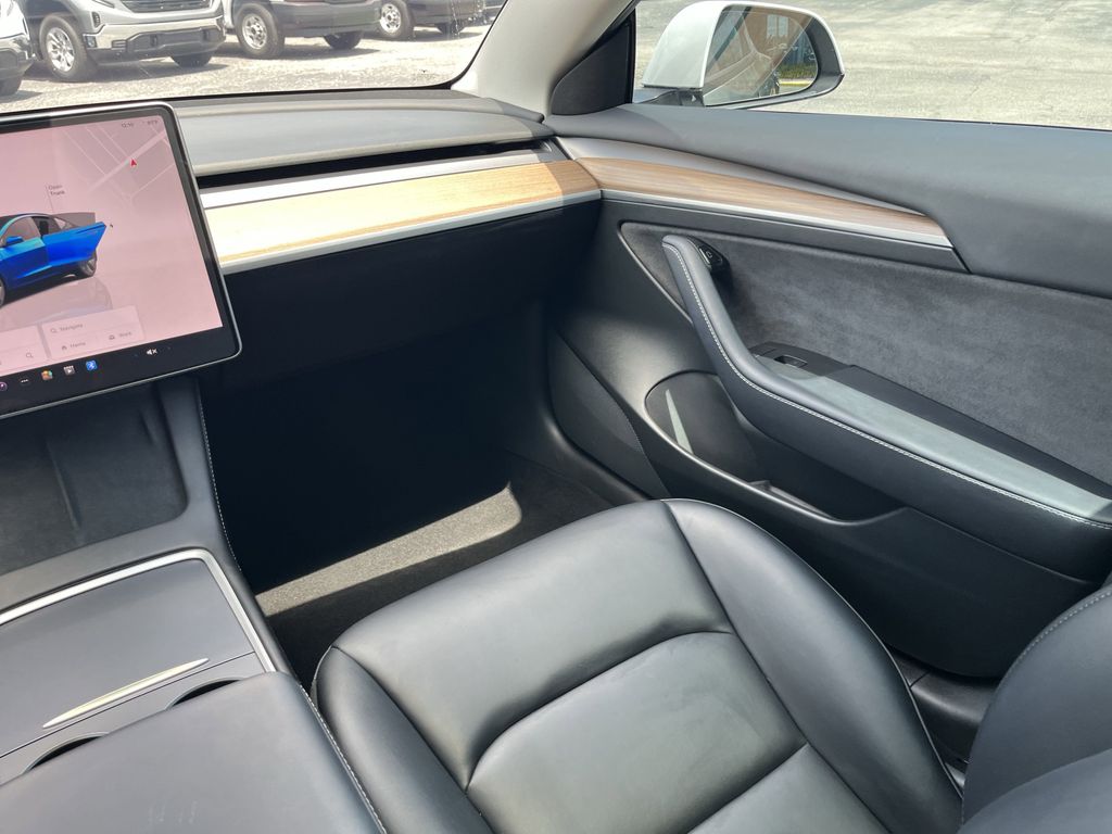 used 2023 Tesla Model 3 car, priced at $27,392
