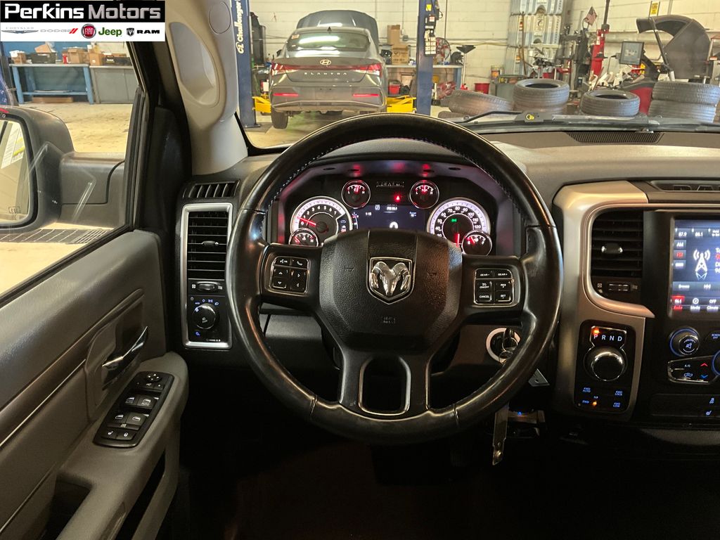 used 2018 Ram 1500 car, priced at $25,280