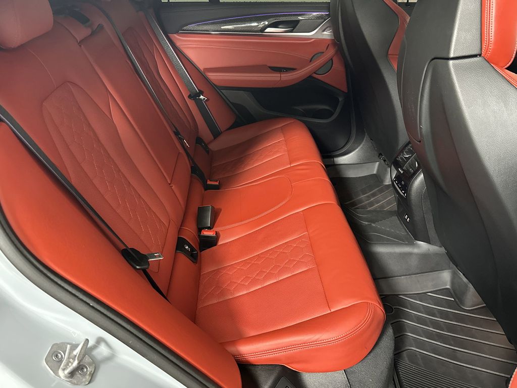 used 2023 BMW X4 M car, priced at $63,892