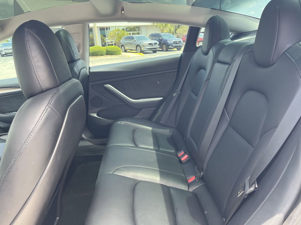 used 2023 Tesla Model 3 car, priced at $27,392