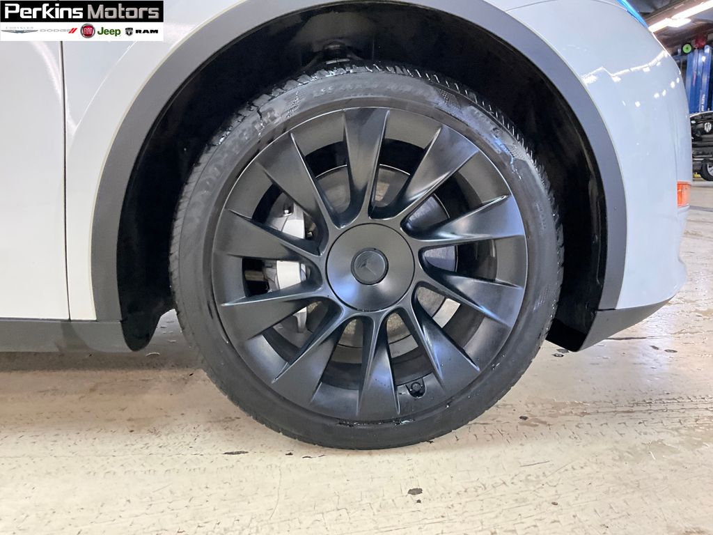 used 2023 Tesla Model Y car, priced at $33,287