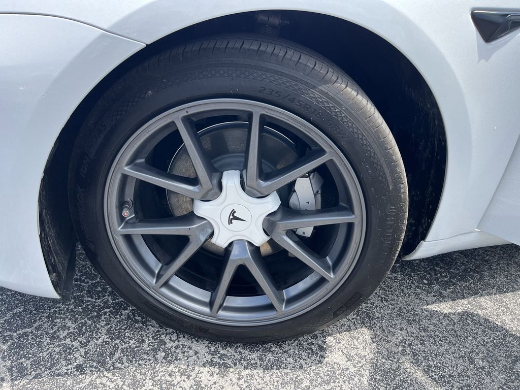 used 2023 Tesla Model 3 car, priced at $27,392