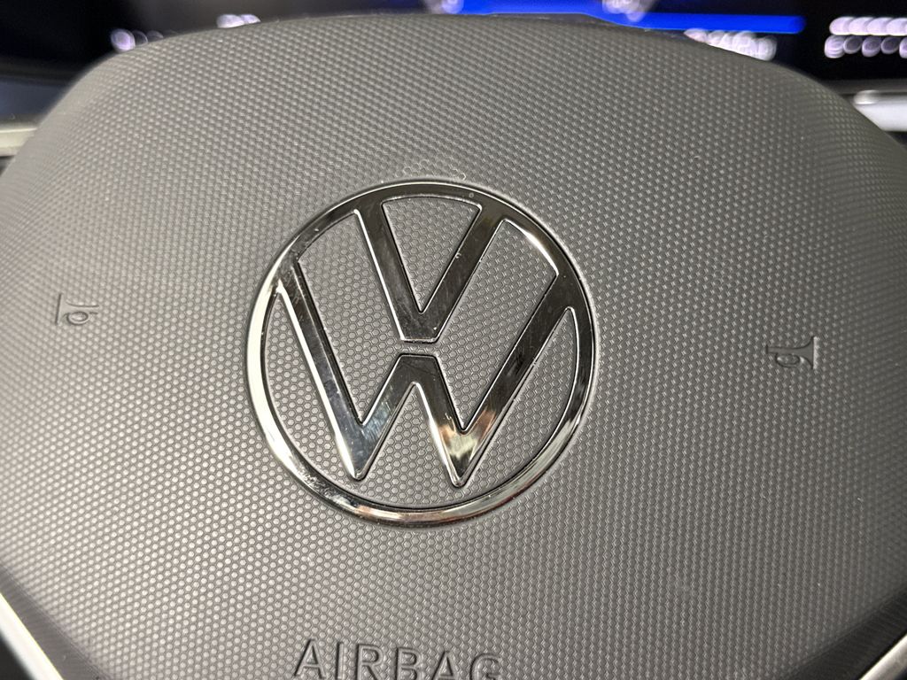 used 2024 Volkswagen Taos car, priced at $19,555