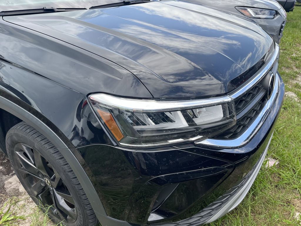 used 2022 Volkswagen Taos car, priced at $18,592