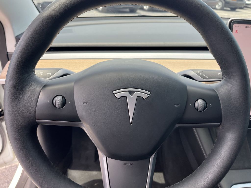 used 2023 Tesla Model 3 car, priced at $27,392