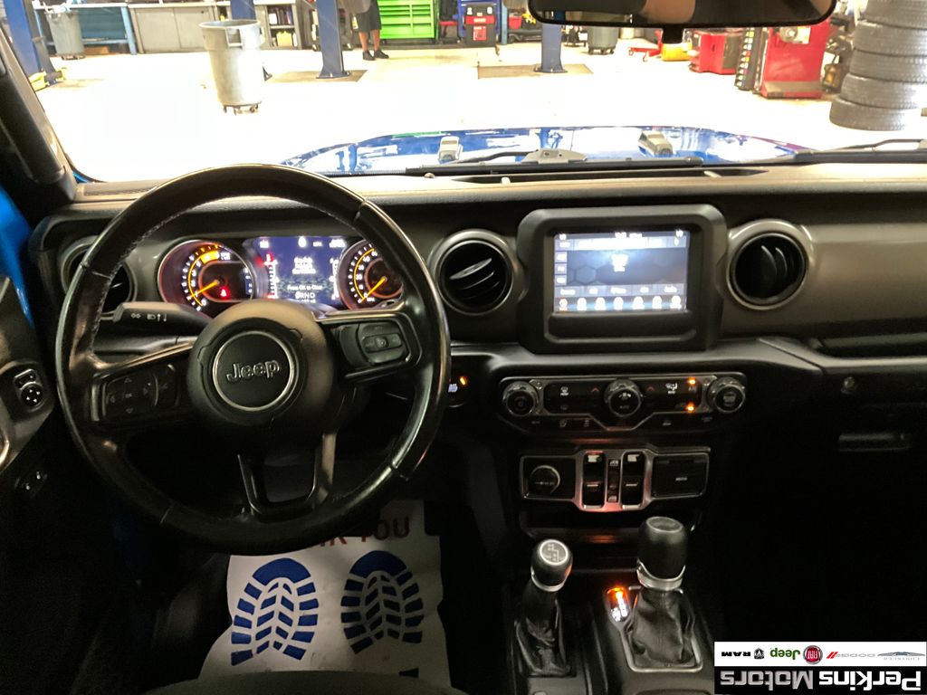 used 2021 Jeep Wrangler car, priced at $30,059
