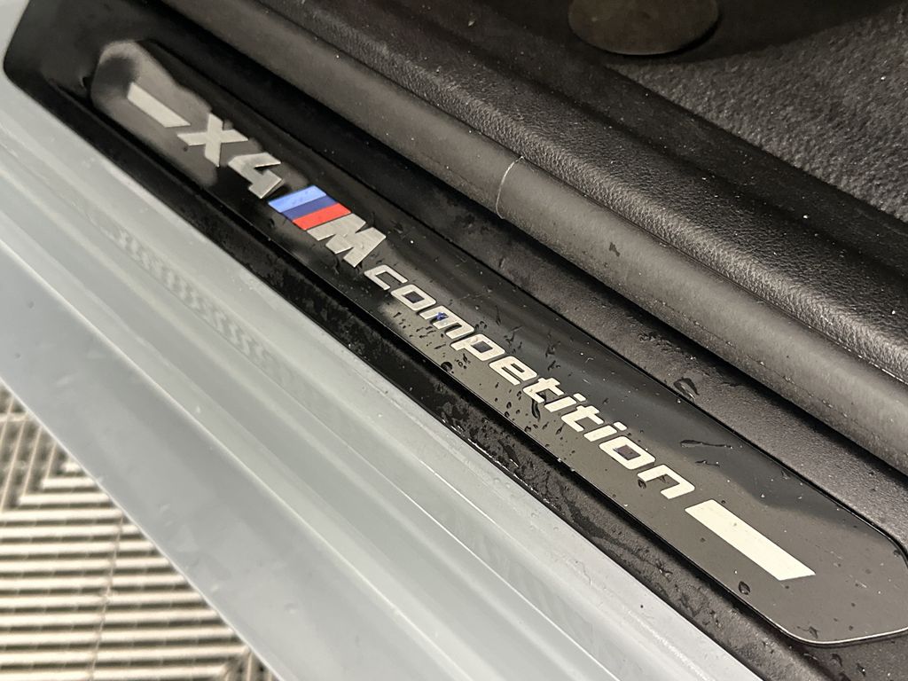 used 2023 BMW X4 M car, priced at $63,892