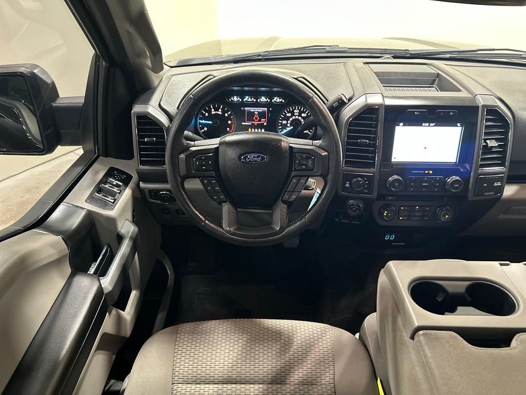 used 2018 Ford F-150 car, priced at $24,165