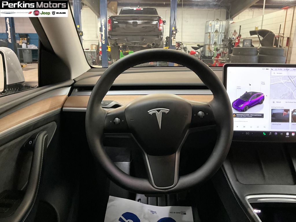 used 2023 Tesla Model Y car, priced at $33,287