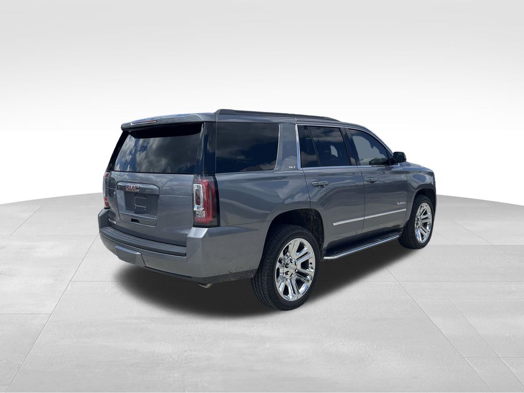 used 2019 GMC Yukon car, priced at $27,591