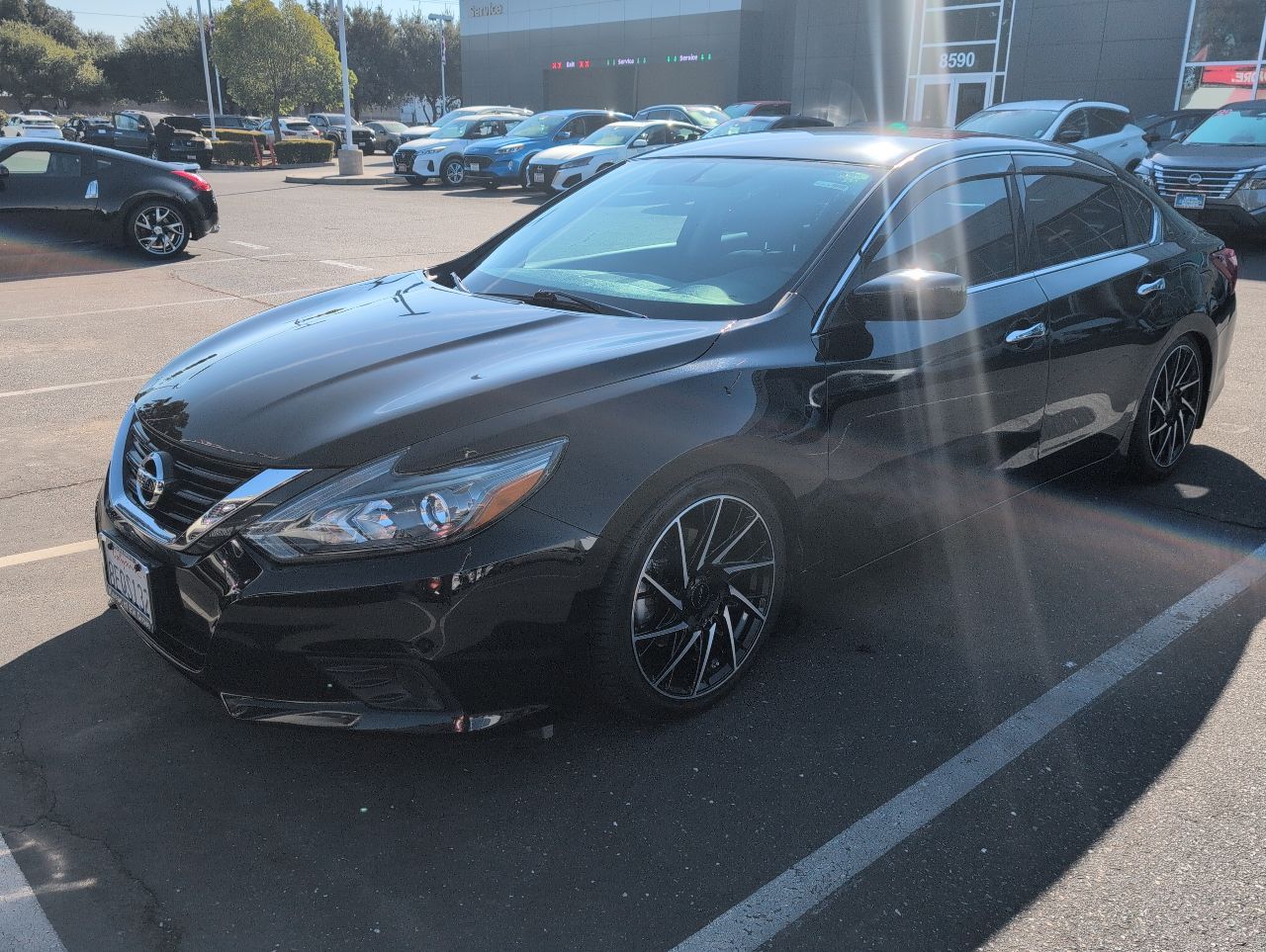 used 2018 Nissan Altima car, priced at $14,999