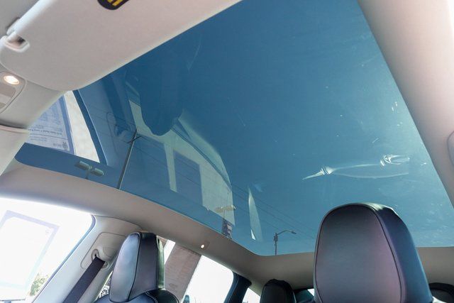 used 2023 Tesla Model Y car, priced at $31,000
