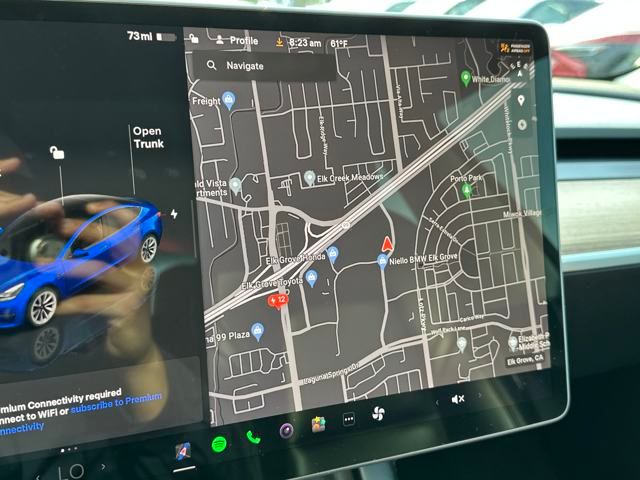 used 2023 Tesla Model 3 car, priced at $27,006