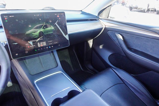 used 2023 Tesla Model Y car, priced at $31,000