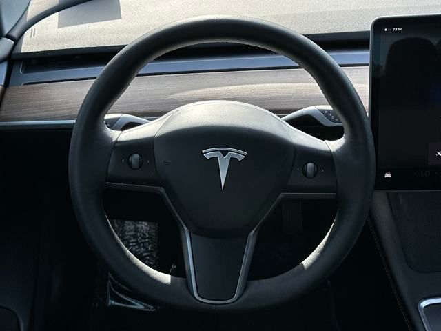 used 2023 Tesla Model 3 car, priced at $27,006