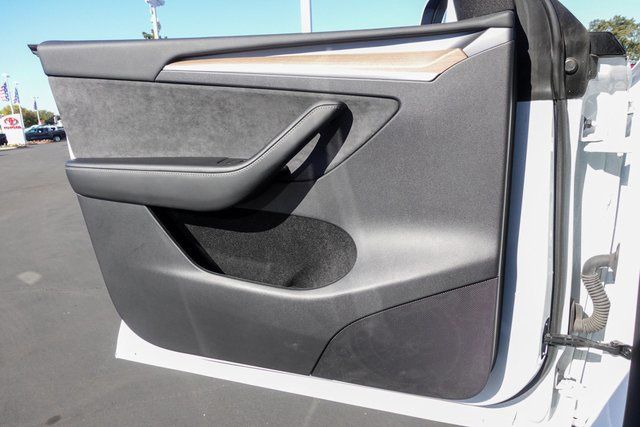 used 2023 Tesla Model Y car, priced at $31,000