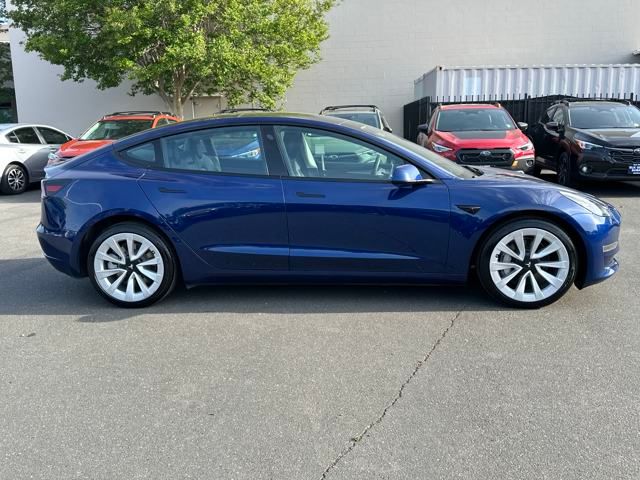 used 2023 Tesla Model 3 car, priced at $27,006