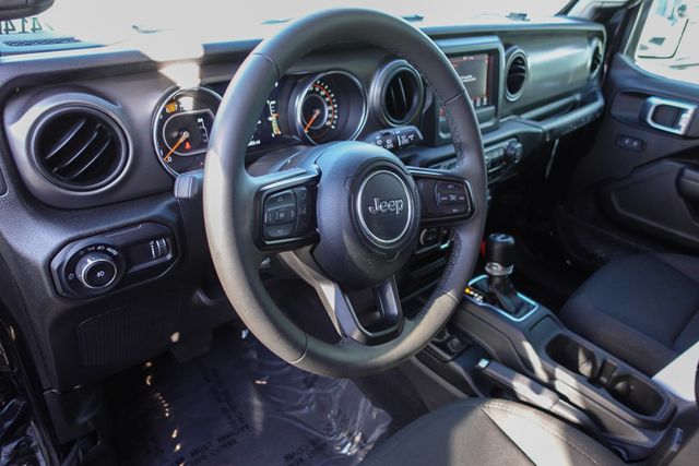 used 2023 Jeep Wrangler car, priced at $35,249