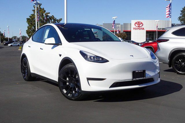 used 2023 Tesla Model Y car, priced at $31,000